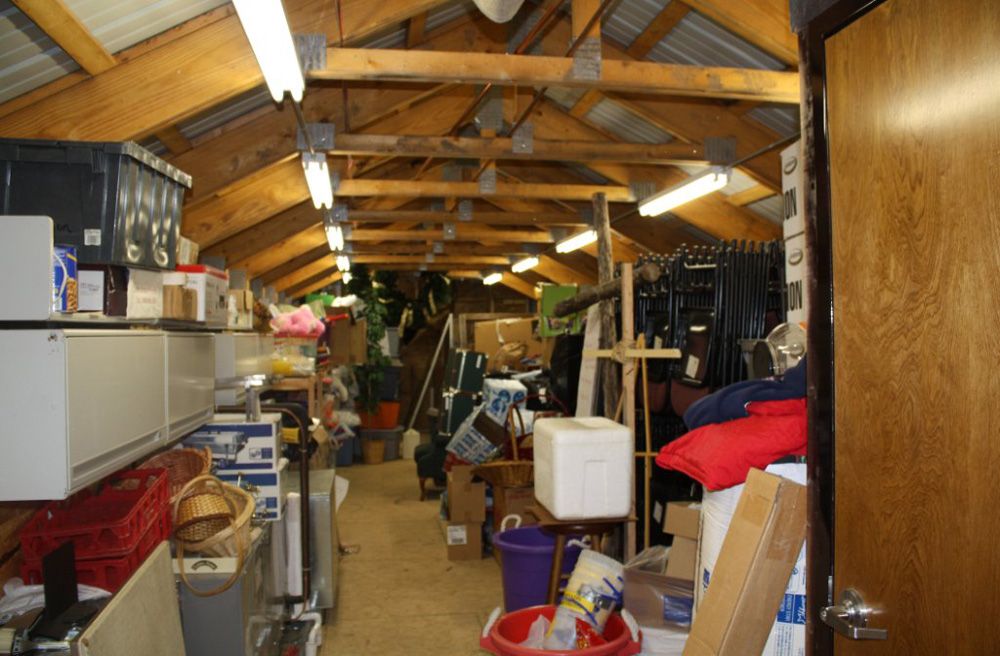 A warehouse filled with lots of boxes and other items